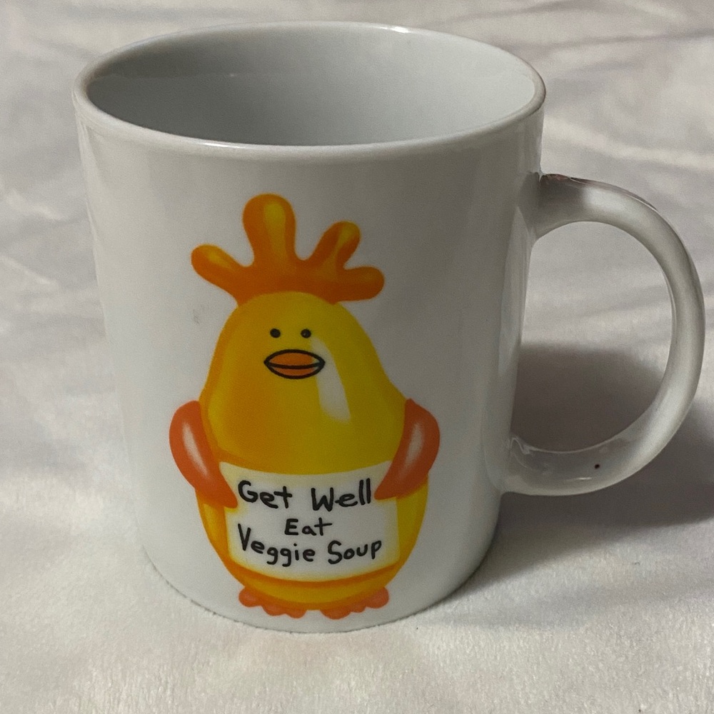 Coffee mug featuring Yellow Chicken holding sign saying get well eat Veggie soup